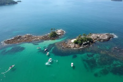 Swim with fish at botinas islands, relax on praia do dentista, and enjoy fresh seafood lunch on this angra dos reis speedboat tour. includes floating noodles.