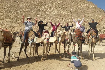 Experience the giza pyramids, camel ride, and egyptian museum in one private cairo day tour. includes hotel pickup, expert guide, and entry fees.