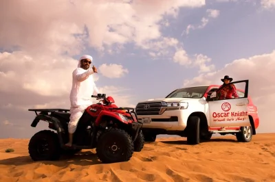 Vivez l’aventure en quad dans le désert de lehbab à dubaï, testez le sandboard, montez à dos de chameau et savourez café arabe et douceurs. transfert hôtel inclus.