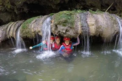 Float through wild canyons, explore a hidden cave, and hike lush jungle trails in puerto rico’s private sanctuary. includes safety gear, lunch, and local guides.