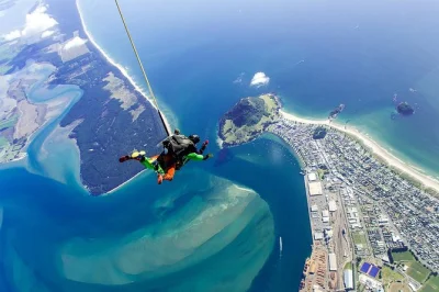 Feel the rush with a tandem skydive over tauranga and bay of plenty. includes scenic flight, expert instructors, and all safety briefings—just show up and jump.
