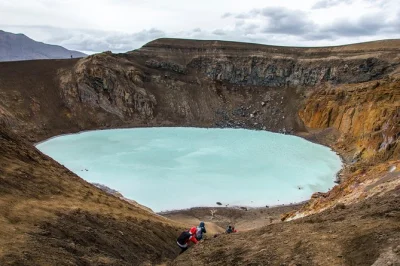 Feel the wild side of iceland on a jeep day trip to askja caldera, hike to víti crater, meet locals, and try a geothermal lake dip. lunch and dinner included.