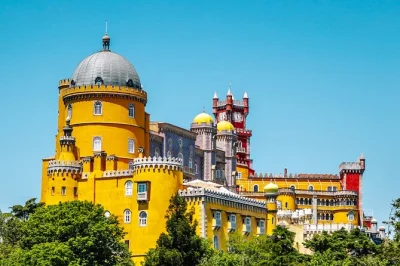 Start your sintra day trip with a local pastry, explore pena palace gardens, ride a tuk tuk past moorish castle walls, and enjoy stories from your guide. includes bottled water.