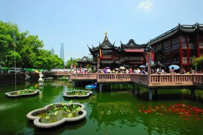 Découvrez shanghai en privé : yu garden, temple du bouddha de jade, concession française, promenade sur le bund. prise en charge à l’hôtel et guide inclus.