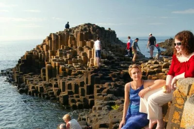 Feel the wild beauty of northern ireland with a relaxed day trip from belfast—walk the giant’s causeway, snap dunluce castle, stroll the dark hedges. includes guide & pickup.