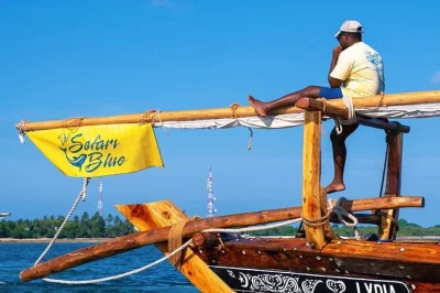 Book a private safari blue tour from fumba village. sail by dhow, snorkel clear waters, enjoy seafood lunch on a sandbank, and visit kwale island.