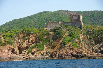 Feel the wild side of corsica by boat—swim in turquoise coves, taste local wine, and wander girolata’s seaside village. includes private transport & local guide.