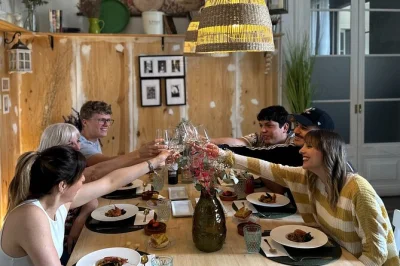 Step inside an 18th-century barcelona apartment for a hands-on paella class, 10-tapas tasting with spanish wines, and a chef-led stroll through la boquería market. includes drinks.