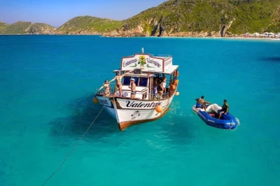 Feel the atlantic breeze on an arraial do cabo boat tour, sip caipirinhas from the open bar, land on remote beaches, and relax with wifi onboard. includes drinks and local crew.