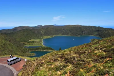 Feel the mist at salto do cabrito, gaze over sete cidades lakes, and taste azorean lunch on this são miguel west island tour—includes pickup and local guide.