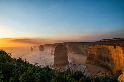 Feel the wild coast, rainforest air, & shipwreck stories on a great ocean road day trip from melbourne. includes pickup, guide, and national park entry.