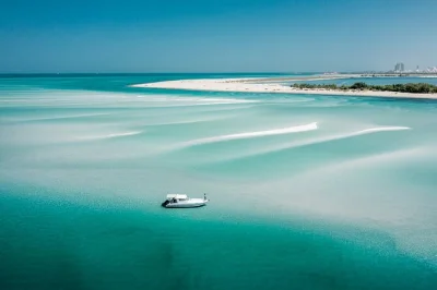 Feel the salt air on a 4-hour abu dhabi island hopping cruise, with photo stops at etihad towers & qasr al watan, dolphin spotting, and beach time. includes refreshments.