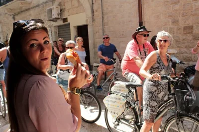 Pedal through bari’s old town, taste focaccia and panzerotti, chat with food artisans, and see swabian castle—includes guide, tastings, and bike rental.