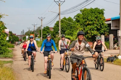 Pedal through phnom penh’s silk island, visit weaving workshops, taste home-cooked lunch on the mekong, and meet local families. includes pickup & ferry.