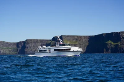 Sail direct from galway city to inis mór and the cliffs of moher, with time to wander island life and cruise under soaring cliffs. includes return ferry and audio guide.