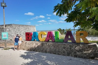 Feel the color shifts of bacalar’s lagoon, swim cenotes, try honey pineapple, and relax with lunch on this costa maya day trip—includes pickup and drinks.