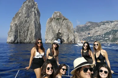 Feel the sea breeze on a capri private boat tour—swim in emerald grottos, pass faraglioni rocks, and enjoy caprese snacks with prosecco. includes towels and snorkel gear.