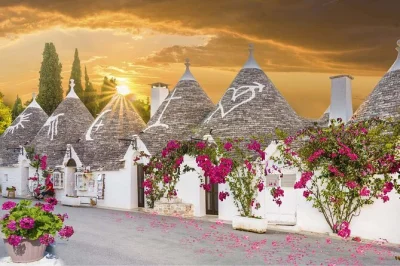 Feel the pulse of puglia on a day trip to alberobello’s trulli, seaside monopoli & polignano a mare. includes pickup, local driver insights & free wifi onboard.