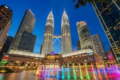 Cross borders from singapore for a private kuala lumpur day trip, including batu caves, kl tower, and sky dining with city views. pickup, guide, and tickets included.
