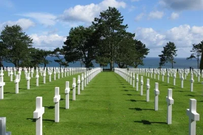 Stand on omaha beach, hear stories at pointe du hoc, and reflect at the normandy american cemetery. includes bayeux pickup and a local guide in a small group.
