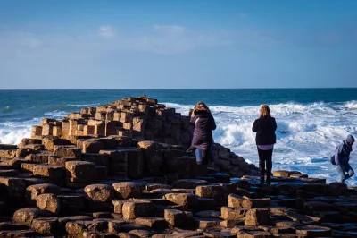 Feel the wind at giant’s causeway, wander castle ruins, and walk the dark hedges on a full-day antrim coast tour from belfast with guide and scenic stops.