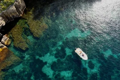 Start your procida adventure by boat with swimming stops, underwater photos, and a friendly skipper. includes snorkeling gear, bottled water, and pickup at marina grande.