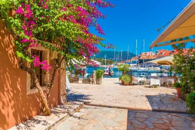 Start your day in kefalonia with wine tasting at a local winery, explore melissani lake by boat, wander fiscardo village, and enjoy hotel pickup included.