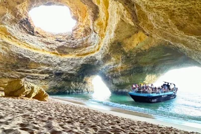 Feel the algarve breeze on a portimão boat tour with dolphin watching, benagil cave visit, and a marine biologist guide. includes all fees and taxes.