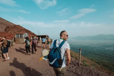 Feel ancient streets beneath your feet in pompeii, then hike to the smoking crater of mount vesuvius. small group, archaeologist guide, minibus transport included.