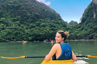 Slip away from cat ba for a quiet day trip through lan ha & ha long bay—kayak caves, swim at empty beaches, and share lunch on deck. includes pickup.