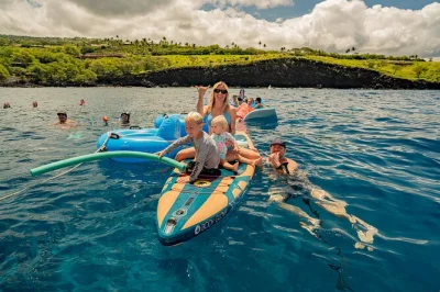 Feel the ocean breeze on a deluxe kona catamaran, snorkel at red hill, spot dolphins, and enjoy breakfast and bbq lunch—all gear and sunscreen included.