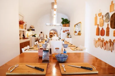Step inside a santorini cave home for hands-on greek cooking, local wine, and a terrace meal. includes all ingredients, lunch, drinks, dessert, and recipe book.