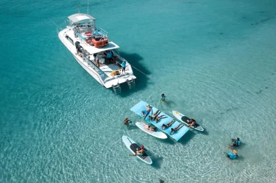 Swim, snorkel, and relax on puerto rico’s icacos island with all-inclusive boat tour—includes lunch, tropical drinks, snorkeling gear, and crew support.