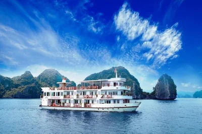 Buchen sie eine 2-tägige halong-bucht-kreuzfahrt: deluxe-kabinen, bai tu long bucht, dorf vung vieng, thien canh son höhle, alle mahlzeiten & transfers inklusive.