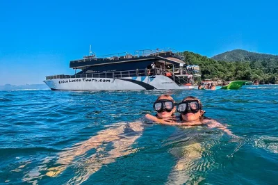 Sail banderas bay on a mega yacht to yelapa, snorkel vibrant waters, hike to a waterfall, and enjoy all-inclusive food, open bar, and water activities with local guides.