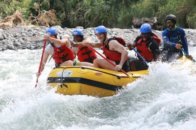 Feel the rush of balsa river white water rafting near la fortuna, costa rica. paddle class 2/3 rapids, swim, snack on fruit, and share a costa rican lunch—includes pickup.