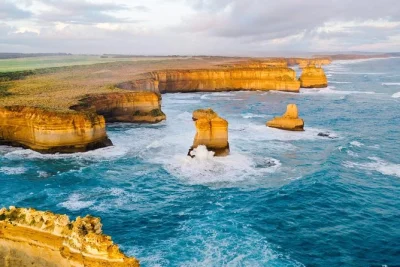 Feel the salt air along victoria’s great ocean road, spot wild koalas, and stand above the twelve apostles. includes city hotel pickup and a local guide.