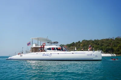 Wake up to pattaya’s turquoise waters, snorkel vibrant reefs, and share a thai buffet on a 73ft catamaran. includes hotel pickup and local guide.