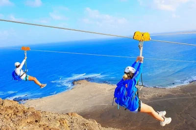 Feel the rush of flying above the atlantic on cape verde’s zipline, with a local aperitif at 100m high, live music, and easy hotel pickup included.