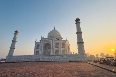 Feel the quiet magic of sunrise at the taj mahal, explore agra fort and baby taj, enjoy a 5-star hotel lunch, and relax with private car pickup from delhi.