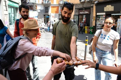 Start your naples food tour with a spritz, taste taralli and pasta frittatina, wander pignasecca market, and finish with sfogliatella or gelato—includes drinks and local guide.
