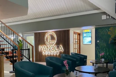 St. lucia flughafen vip lounge mit kostenlosem resort-transfer, snacks, bar und exklusiven annehmlichkeiten für einen entspannten abflug.