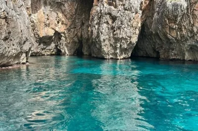 Feel the salt breeze as you explore santa maria di leuca’s sea caves by boat, swim in clear water, sip local wine, and snack on tarallini. includes skipper.