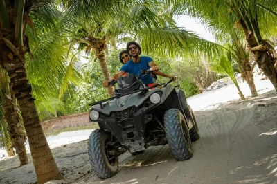 Feel the rush on playa maroma with an atv jungle ride and your choice of speedboat or waverunner, including lunch, beach club access, and roundtrip pickup.