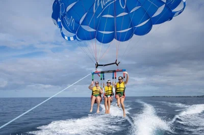 Soar above kona’s coast on a big island parasailing ride, guided by locals. includes all equipment, small group comfort, and flexible booking for families.