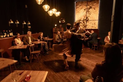 Step inside buenos aires’ secret tango society for an unscripted, up-close performance with live musicians, intimate seating, and a glass of wine included.