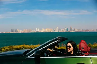 Qingdao Privattour: BMW Cabrio mit Fotografie