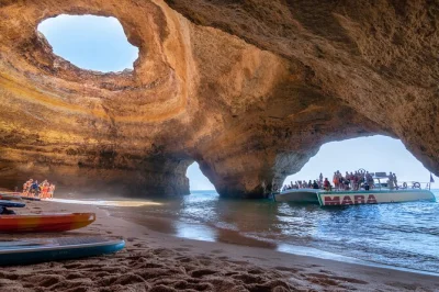 Feel the breeze along the algarve coast on a catamaran cruise to benagil caves, with live commentary, a swim stop, and a glass of champagne before heading back.