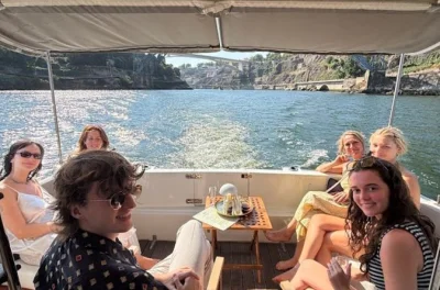 Feel porto’s riverside life on a douro cruise with port wine, passing ribeira and the luís i bridge. includes welcome drink, certified crew, and sunset option.