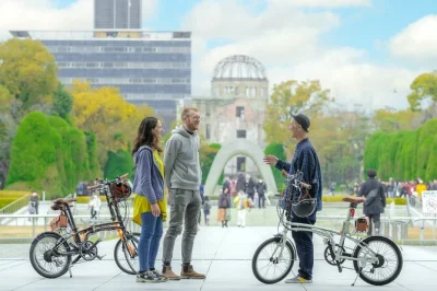 Step onto hiroshima’s streets by e-bike, hear stories at peace memorial park, see a-bombed streetcars, and visit bombed heritage sites with a local guide—includes bike rental.